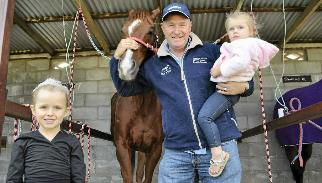 Warwick trainer Jack Brown and granddaughters Lacinda, 5, (left) and Rubi, 2, check on Dodgy Cat before his big race at the Ergon Energy Race Day on Saturday. Warwick trainer Jack Brown and granddaughters Lacinda, 5, (left) and Rubi, 2, check on Dodgy Cat before his big race at the Ergon Energy Race Day on Saturday.